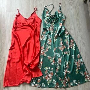Two midi silky slip type dresses size medium.